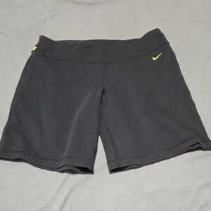 Nike Women's Black Shorts with Yellow Swoosh